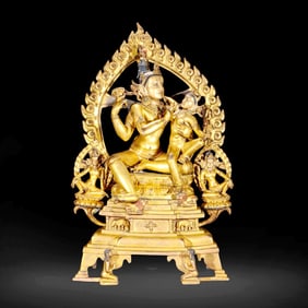 A GILT-BRONZE STATUE OF GUANYIN
