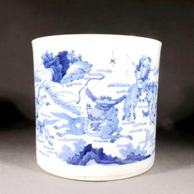 A LARGE BLUE-AND-WHITE BRUSH POT WITH FIGURAL SCENES