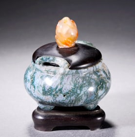 A JADEITE TRIPOD CENSER WITH BRIDGE HANDLE