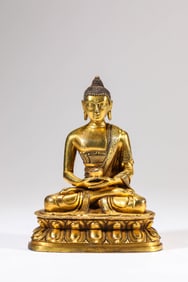 A Gilt-Bronze Figure of Medicine Buddha