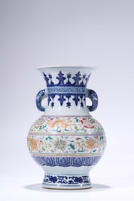 A Blue and White with Famille-Rose 'Eight Treasures' Vase