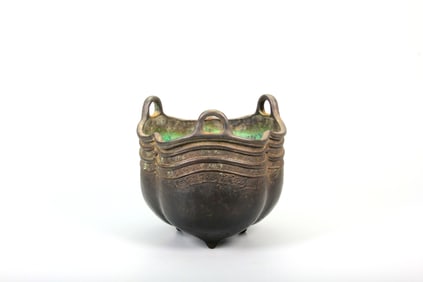 A TRIPOD CENSER WITH THREE HANDLES