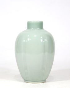 A POWDER-BLUE-GLAZED RIBBED VASE