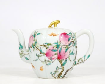 A FAMILLE ROSE 'PEACH AND BAT' MELON-SHAPED TEAPOT