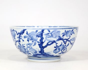 A BLUE AND WHITE 'PEACH AND CRANE' BOWL
