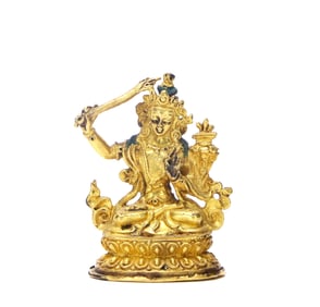 A GILT-BRONZE FIGURE OF BUDDHA