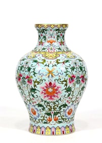 A GREEN-GROUND FAMILLE ROSE 'FLORAL' VASE