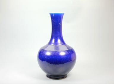 A BLUE GLAZED GLOBULAR VASE