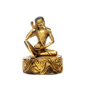 A GILT-BRONZE FIGURE OF BUDDHA