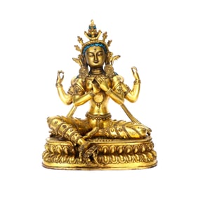 A GILT-BRONZE FIGURE OF BUDDHA'S MOTHER