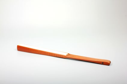 A CARVED BAMBOO FOLDING FAN WITH POETIC INSCRIPTIONS