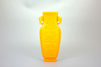 A YELLOW-OPAQUE-GLASS 'BEAST MASK AND PHOENIX' VASE WITH ELEPHANT HANDLES, JIAQING MARK