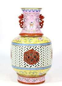A FAMILLE ROSE 'REVOLVING' VASE