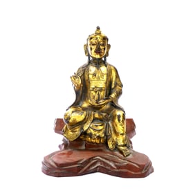 A GILT-BRONZE FIGURE OF BUDDHA