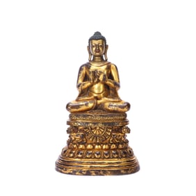A GILT-BRONZE FIGURE OF BUDDHA