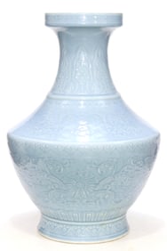 A SKY-BLUE-GLAZED VASE CARVED WITH FLOWERS