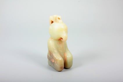 A HETIAN JADE BIRD HEAD FIGURINE