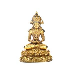A GILT-BRONZE FIGURE OF BUDDHA