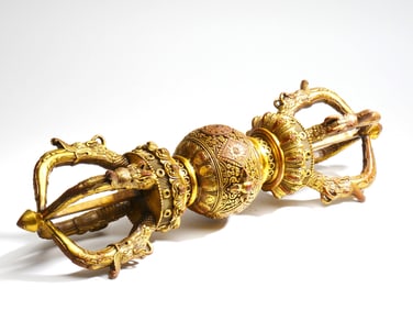 A GILT-BRONZE VAJRA