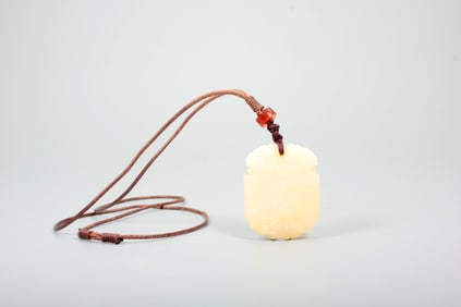 A HETIAN JADE PLAQUE WITH BEAST PLAQUE