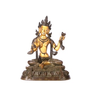 A GILT-BRONZE FIGURE OF TARA