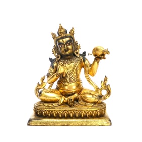 A GILT-BRONZE FIGURE OF YELLOW JAMBHALA