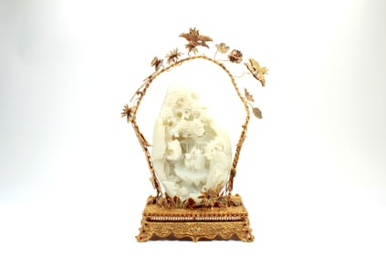 A JADE SHANZI WITH GEM INLAID