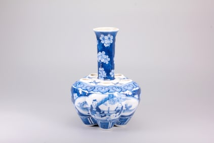 A BLUE AND WHITE 'FIGURAL'SPOUTED VASE