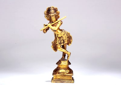 A GILT BRONZE FIGURE OF SEATED BUDDA