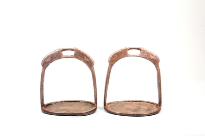 A PAIR OF IRON-SILVER INLAID STIRRUPS