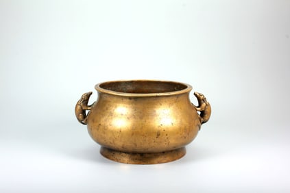 A BRONZE CENSER WITH TWO SQUIRREL HANDLES