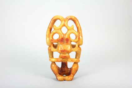 A HONGSHAN JADE FIGURE