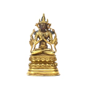 A GILT-BRONZE FIGURE OF BUDDHA
