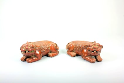 A PAIR OF 'LION'PAPER WEIGHT