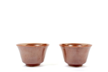 A PAIR OF BROWN-GLAZED CUPS