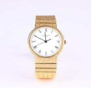 A Patek Philippe 18k Gold Automatic Mechanical Watch