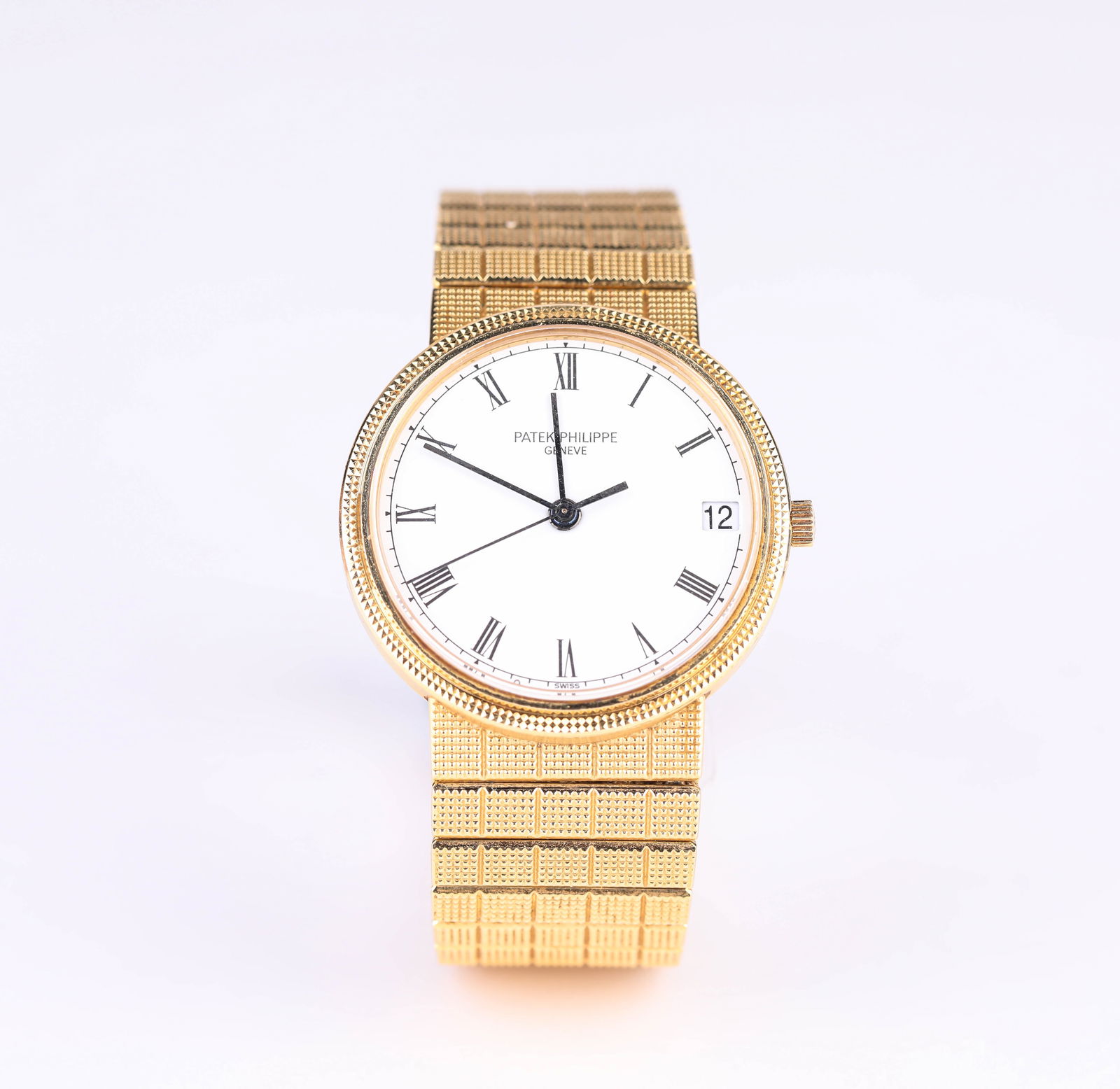 A Patek Philippe 18k Gold Automatic Mechanical Watch