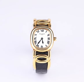 A Patek Philippe 18k Gold Quartz Watch