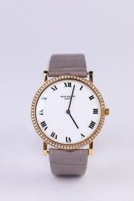 A Patek Philippe 18k Gold Diamond-Set Mechanical Watch