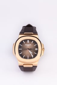 A Patek Philippe 18k Gold Automatic Mechanical Watch