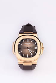 A Patek Philippe 18k Gold Automatic Mechanical Watch: A Patek Philippe 18k Gold Automatic Mechanical Watch (44cm)