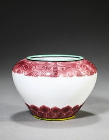 A Purple-Over-White Glass 'Animal-Mask' Bowl