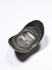 A Ten-Tael Silver Ingot