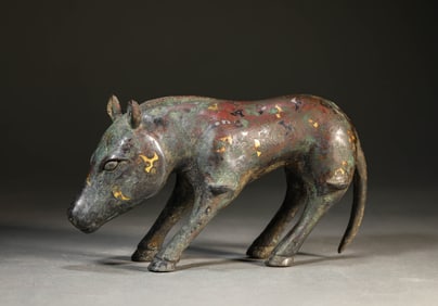 A Gold-and-Silver Inlaid Bronze Auspicious Beast