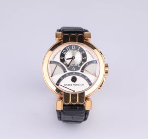 A Harry Winston 18k Gold Automatic Mechanical Watch