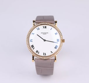 A Patek Philippe 18k Gold Manual Mechanical Watch