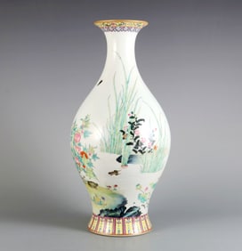 A FAMILLE ROSE "LOTUS" OLIVE-SHAPED VASE