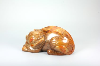 A HETIAN JADE RECLINING TIGER