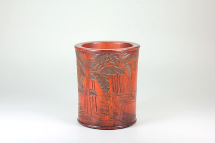 A HUANGHUALI WOOD BRUSH POT WITH "JIAO BAMBOO AND READING" DESIGN