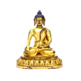 A GILT-BRONZE FIGURE OF BUDDHA
